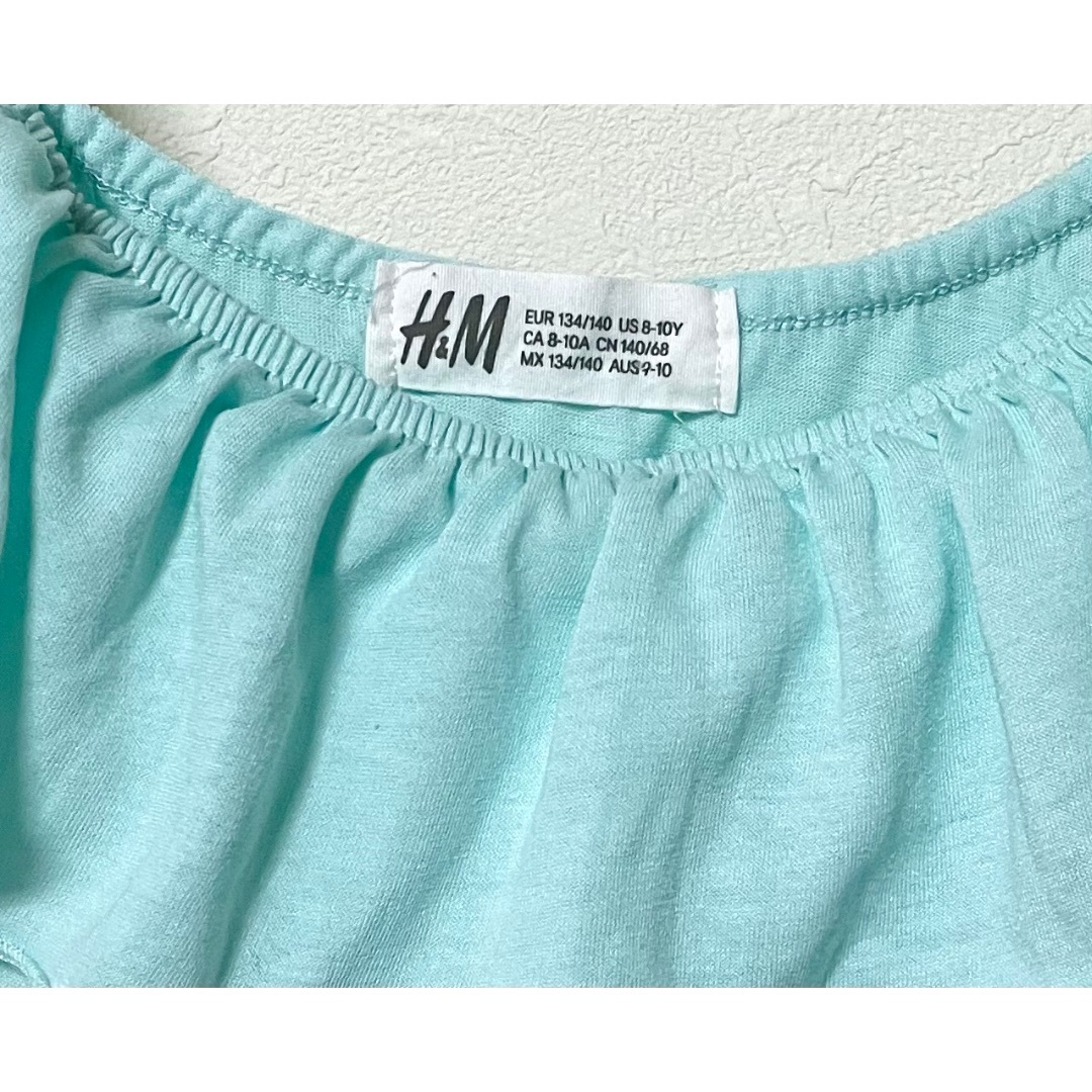 H&M(エイチアンドエム)のH&M ノースリーブ フリル カットソー セット 140 キッズ/ベビー/マタニティのキッズ服女の子用(90cm~)(Tシャツ/カットソー)の商品写真