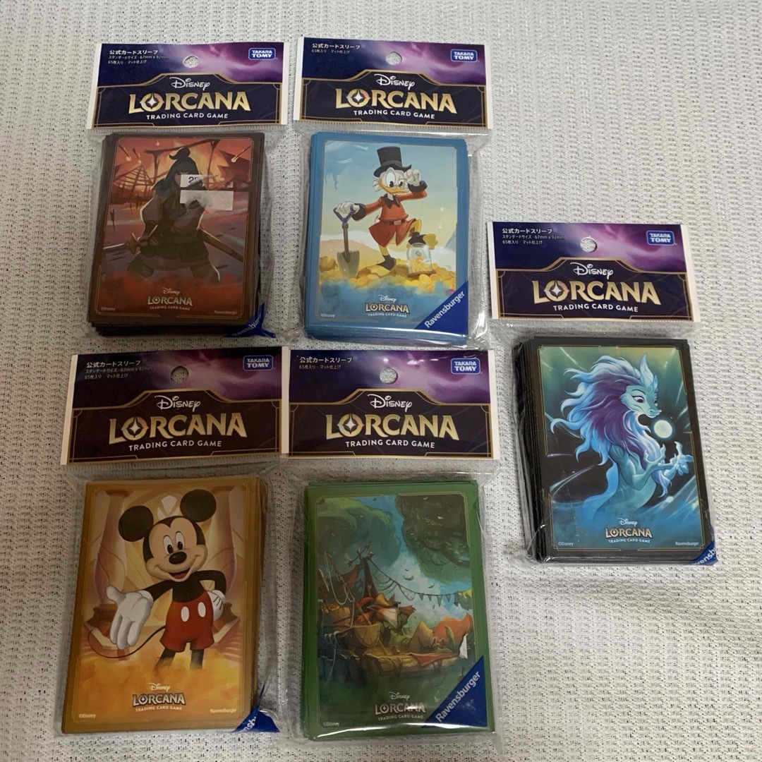 Disney(ディズニー)の新品未開封 ディズニーロルカナ 公式カードスリーブ 5種セット エンタメ/ホビーのトレーディングカード(カードサプライ/アクセサリ)の商品写真