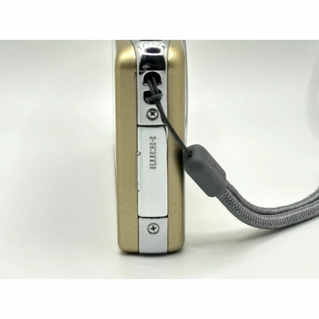 Panasonic(パナソニック)のPanasonic LUMIX FX-77 タッチパネル ゴールド 付属品付き スマホ/家電/カメラのカメラ(コンパクトデジタルカメラ)の商品写真
