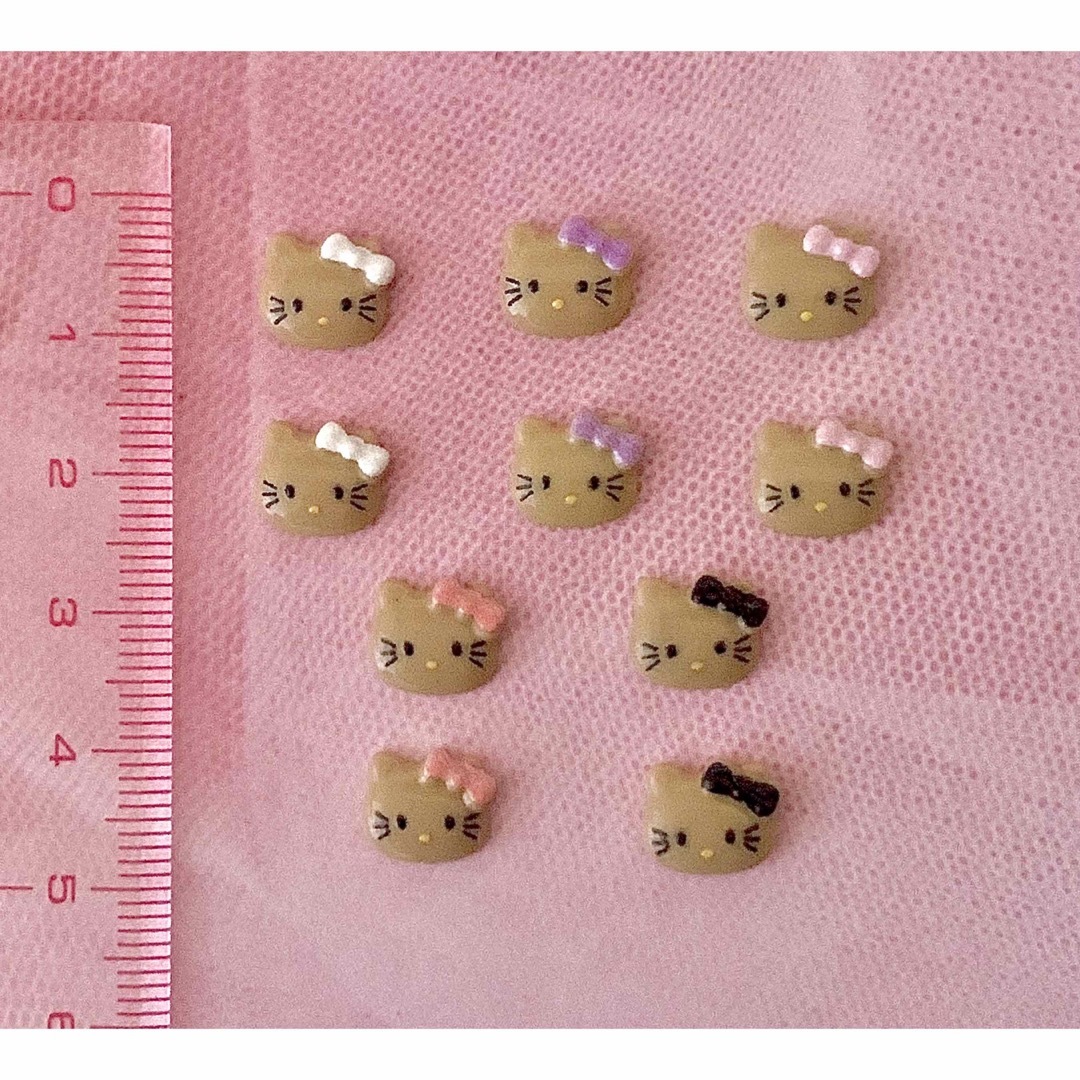 ハローキティ(ハローキティ)の【ネイルパーツ】日焼けキティ/ガングロキティ/平成キティ/ネイルパーツセット コスメ/美容のネイル(デコパーツ)の商品写真