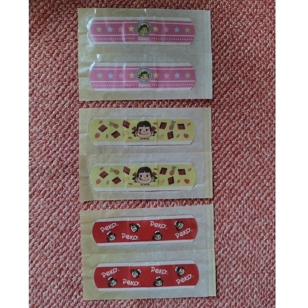 ぺこちゃん 絆創膏 エンタメ/ホビーのおもちゃ/ぬいぐるみ(キャラクターグッズ)の商品写真