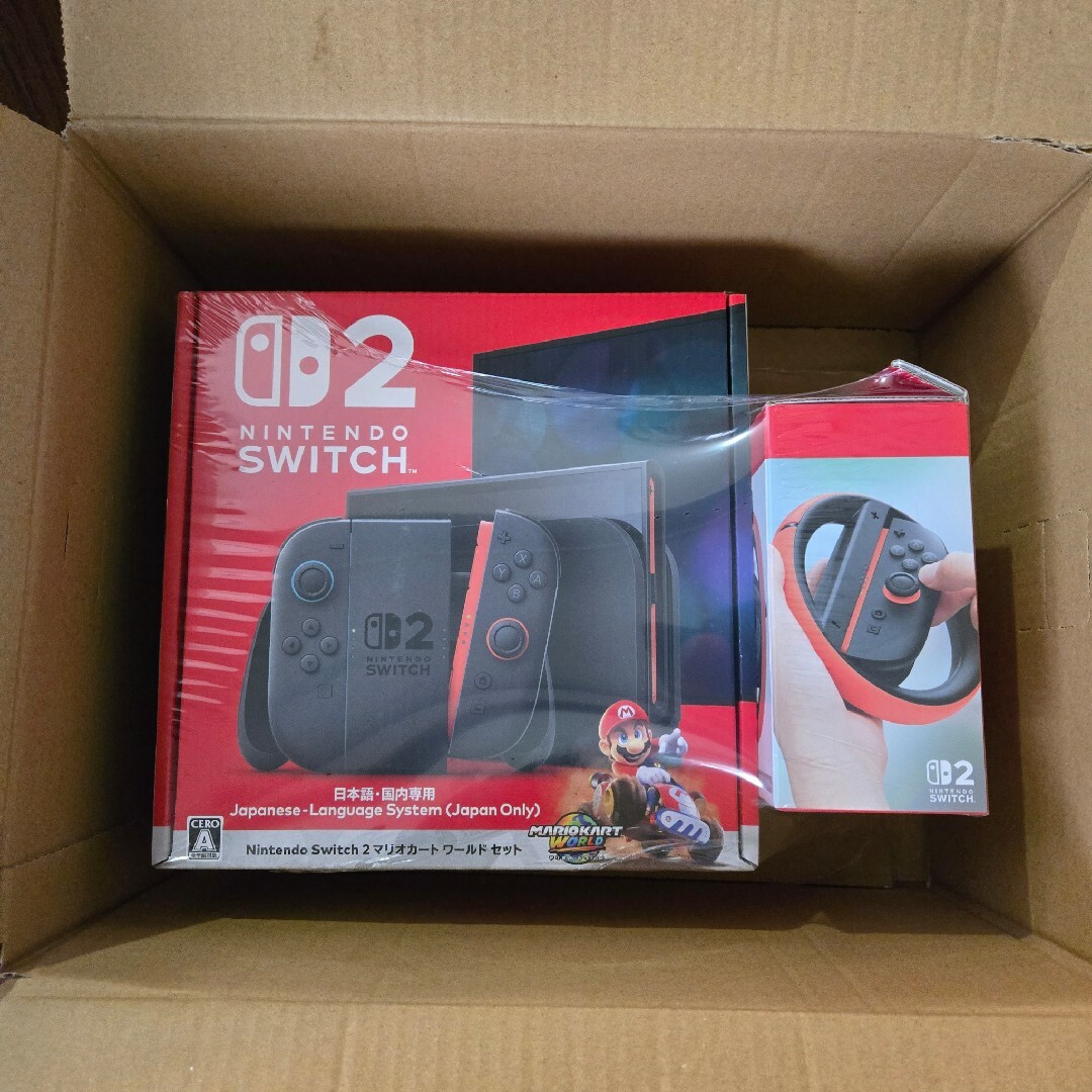 Nintendo Switch(ニンテンドースイッチ)のSwitch2 マリオカートワールドセット + Joy-Con2 ハンドルセット エンタメ/ホビーのゲームソフト/ゲーム機本体(家庭用ゲーム機本体)の商品写真