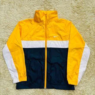 ナイキ(NIKE)のNike ナイロンジャケット イエロー ネイビー フード付き　M(ナイロンジャケット)