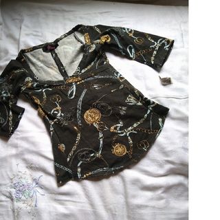 【新品 未使用】5分袖  腰開き トップス(カットソー(半袖/袖なし))