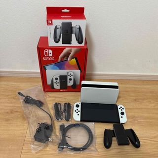 ニンテンドウ(任天堂)のNintendoSwitch 有機EL + Joy-Con充電グリップ　セット(家庭用ゲーム機本体)