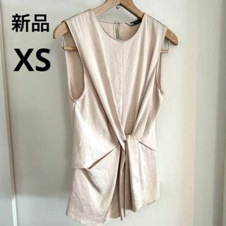 ザラ(ZARA)の新品　ZARA ノースリーブ　カットソー　ペプラム　ベージュ　XS ブラウス(シャツ/ブラウス(半袖/袖なし))