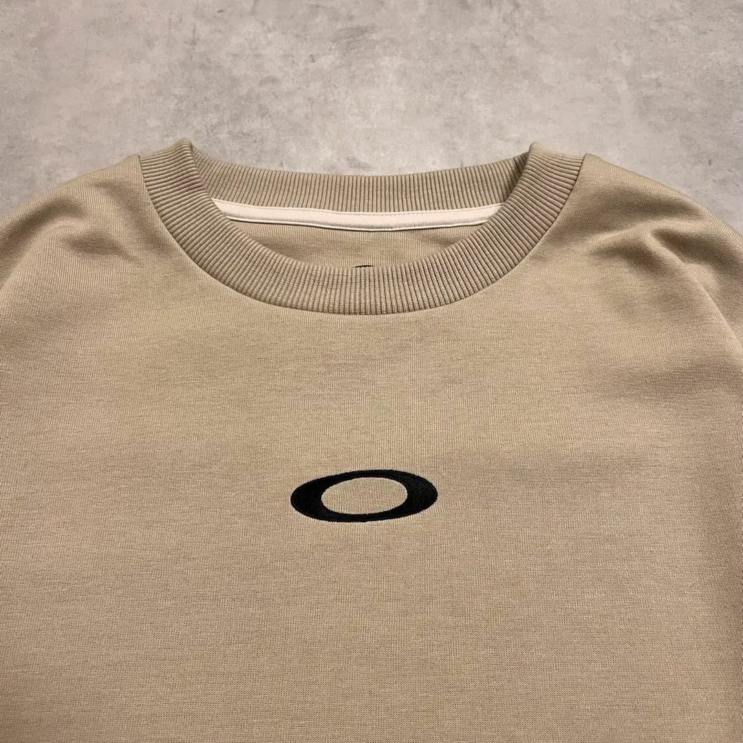 Oakley - OAKLEY center logo sweat beige Lsizeの通販 by かっ