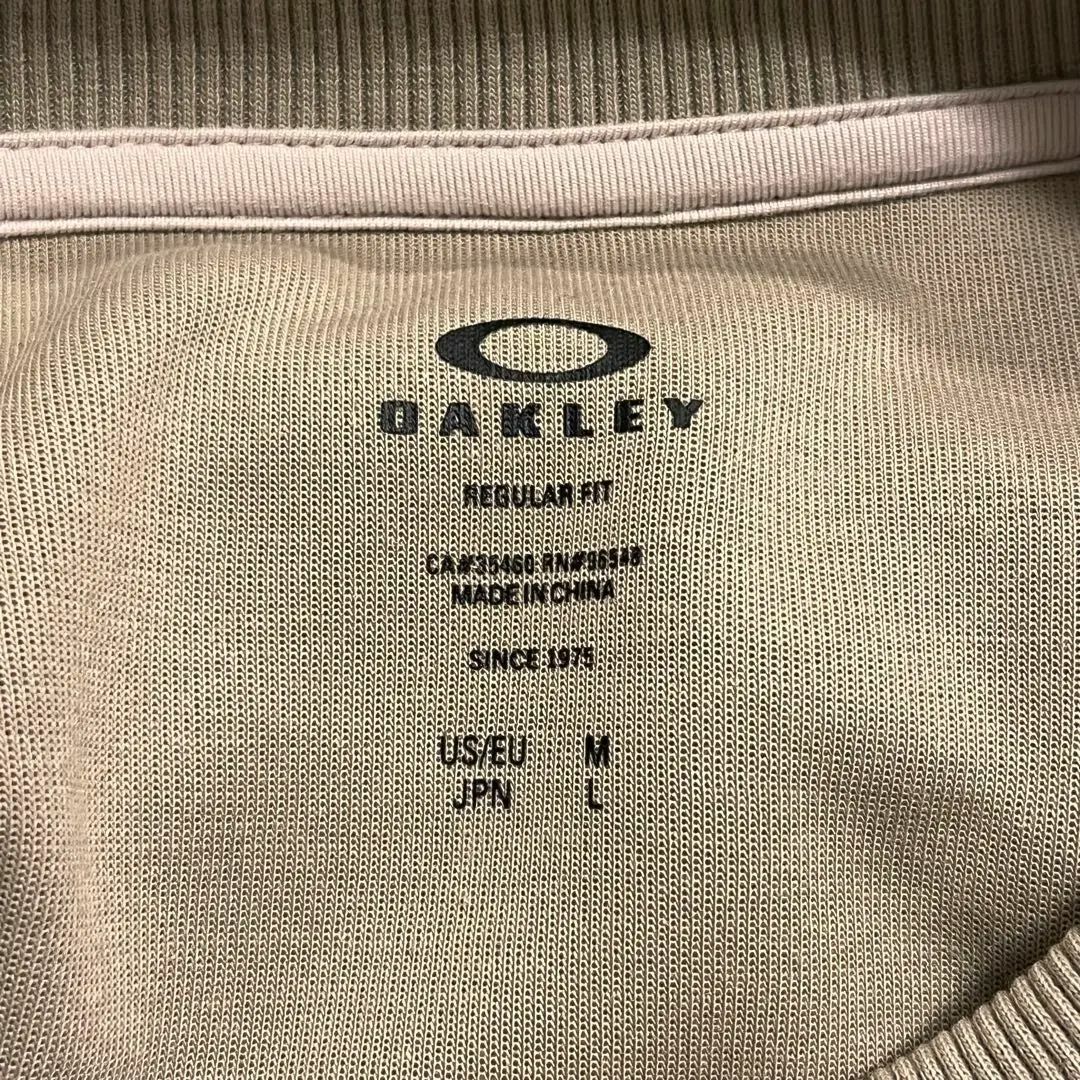 Oakley - OAKLEY center logo sweat beige Lsizeの通販 by かっ