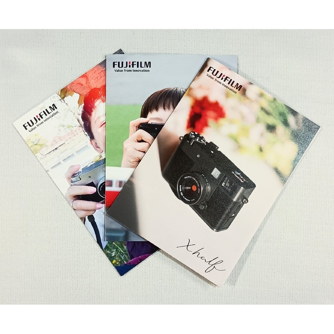 富士フイルム(フジフイルム)の未使用 FUJIFILM X half カタログ×3冊 送料無料！ スマホ/家電/カメラのカメラ(その他)の商品写真