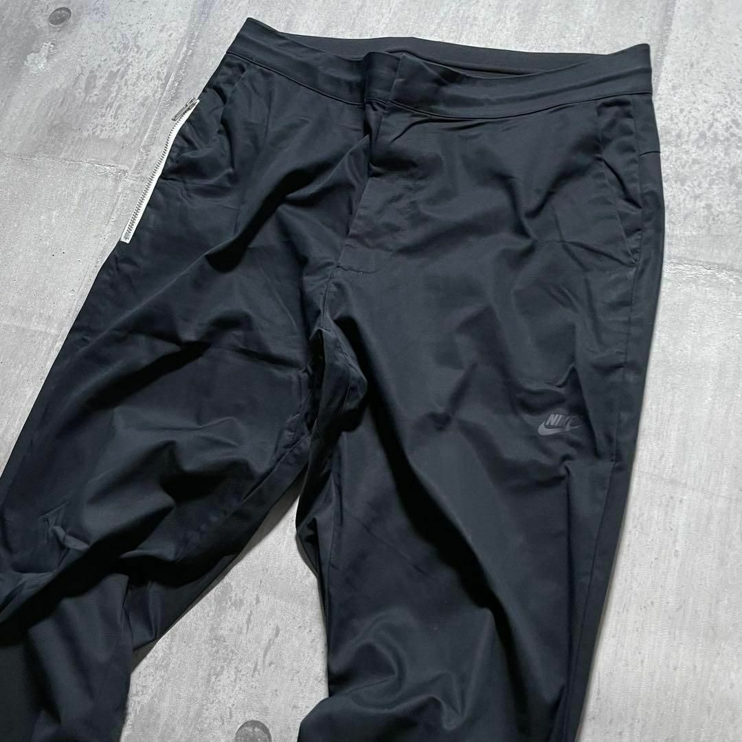 NIKE(ナイキ)のNIKE エッセンシャル ウーブン クロップド ジョガーパンツ y2k テック系 メンズのパンツ(その他)の商品写真