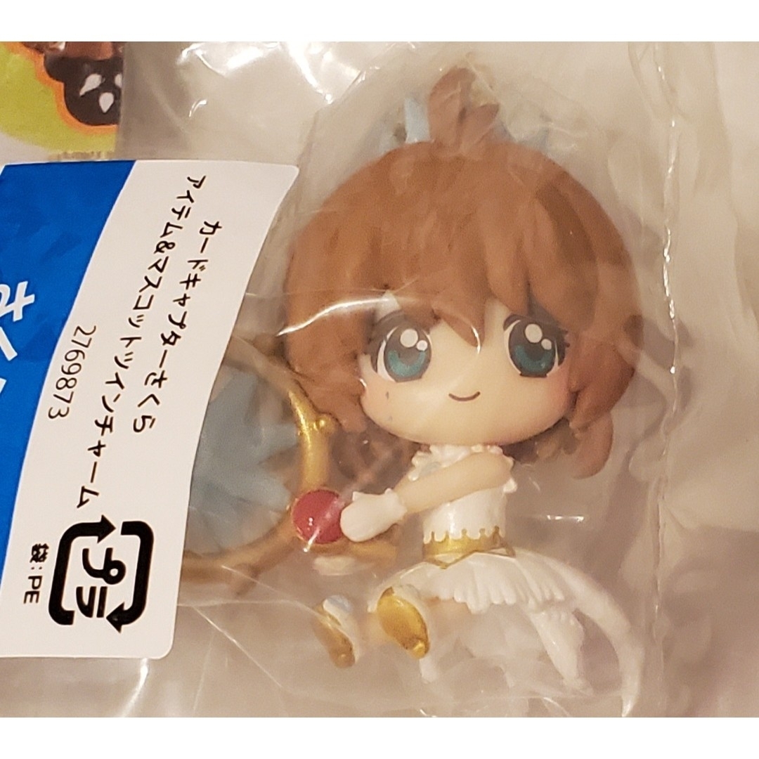 講談社(コウダンシャ)のカードキャプターさくら アイテム&マスコットツインチャーム クリアカード エンタメ/ホビーのアニメグッズ(キーホルダー)の商品写真