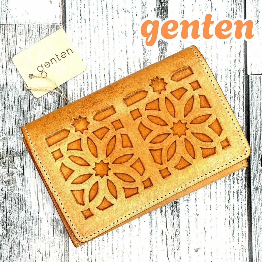 genten(ゲンテン)のgenten 二つ折りカードケース カットワーク 本革 ヌメ革　茶 レディースのファッション小物(名刺入れ/定期入れ)の商品写真