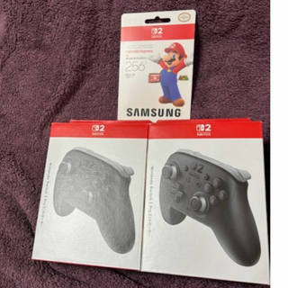 ニンテンドウ(任天堂)のSwitch2 Proコントローラー2台とSDカード(その他)