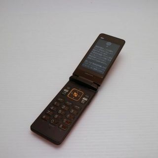 キョウセラ(京セラ)の新品同様 au GRATINA オレンジ 白ロム M666(携帯電話本体)