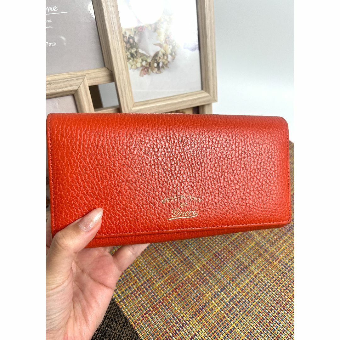 Continental wallet with Gucci script in Rosso Ancora red