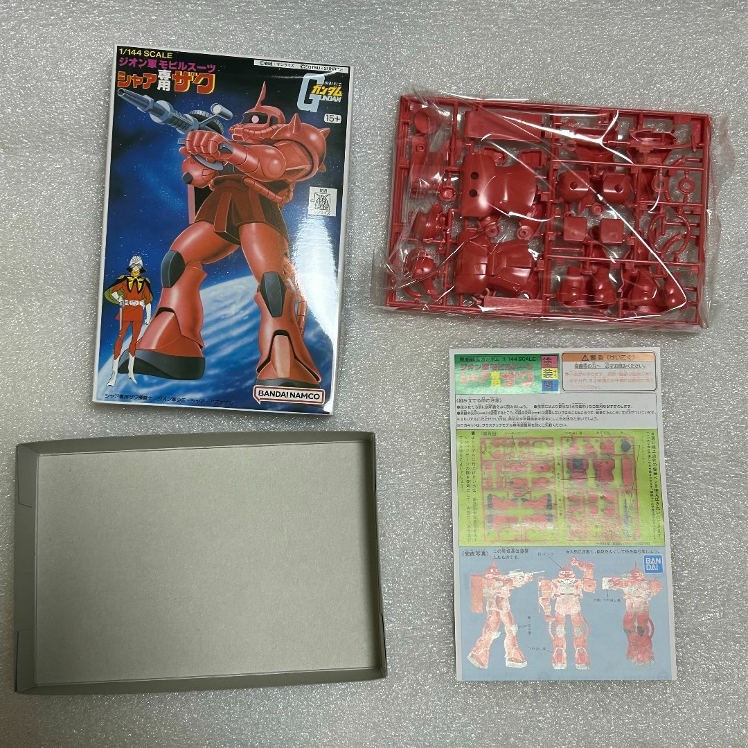 BANDAI NAMCO Entertainment(バンダイナムコエンターテインメント)の【ガンプラ☆新品☆希少】旧キット シャア専用ザク 1/144 エンタメ/ホビーのおもちゃ/ぬいぐるみ(プラモデル)の商品写真