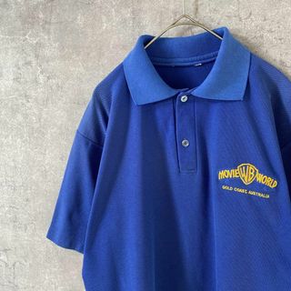 90sWarner Brosポロシャツ 青 ゴールドコースト　メンズMサイズ