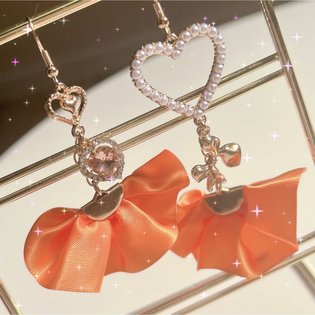 推しカラー＊オレンジリボンピアス ハンドメイドのアクセサリー(ピアス)の商品写真