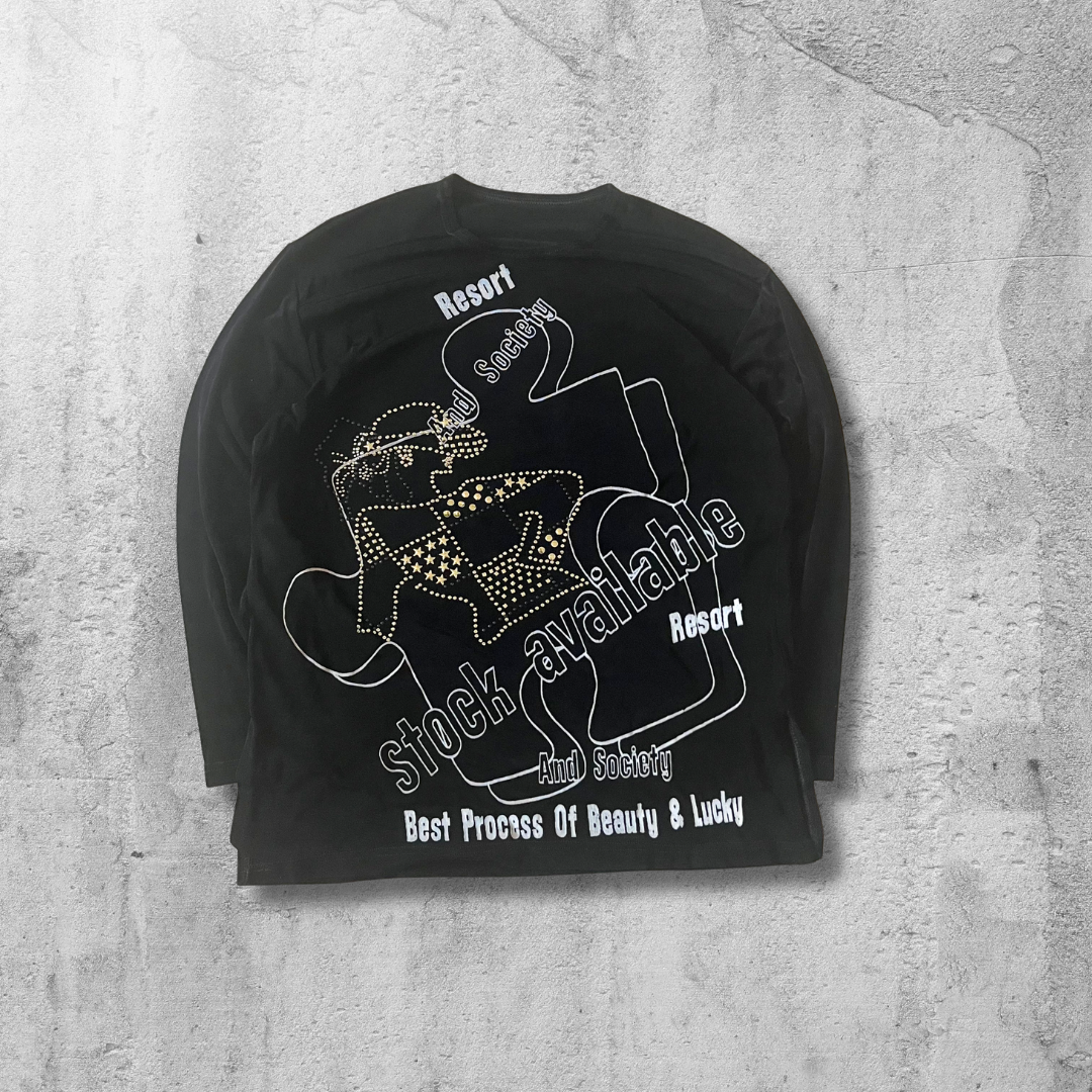 レディース ロンT 黒 バックプリント ラインストーン入り 個性派トップス レディースのトップス(Tシャツ(長袖/七分))の商品写真