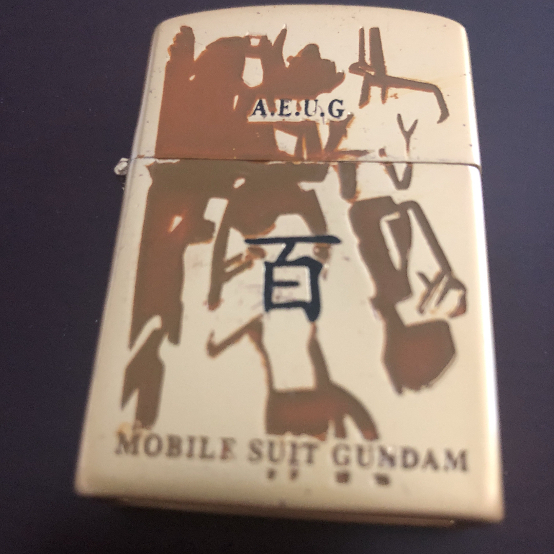 BANDAI(バンダイ)のジッポ風オイルライター　百式 機動戦士ガンダム　ライター　ガンダム メンズのファッション小物(タバコグッズ)の商品写真