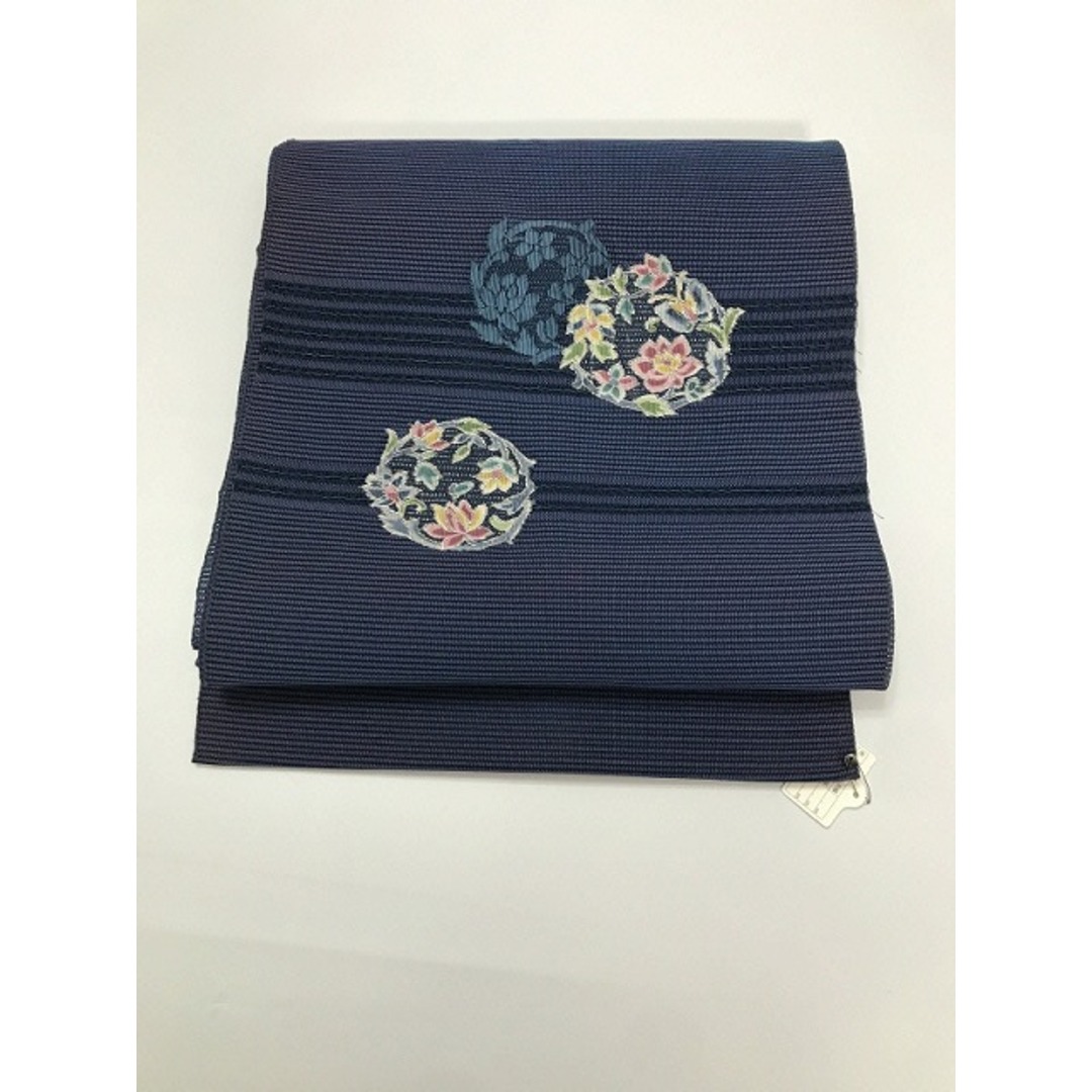 【中古】名古屋帯 化繊 濃紺地に花丸紋文様 夏帯 レディースの水着/浴衣(帯)の商品写真