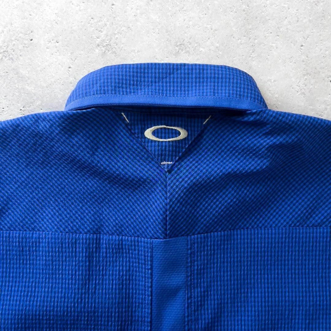 Oakley(オークリー)の極美品 オークリー ゴルフ 半袖 ドライ シャツ メンズ M ブルー スカル刺繍 スポーツ/アウトドアのゴルフ(ウエア)の商品写真