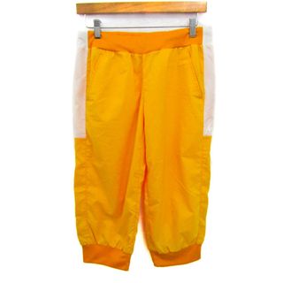 ルコックスポルティフ(le coq sportif)のルコックスポルティフ クロップドパンツ ボトムス 大きいサイズ スポーツウエア レディース Oサイズ オレンジ le coq sportif(クロップドパンツ)