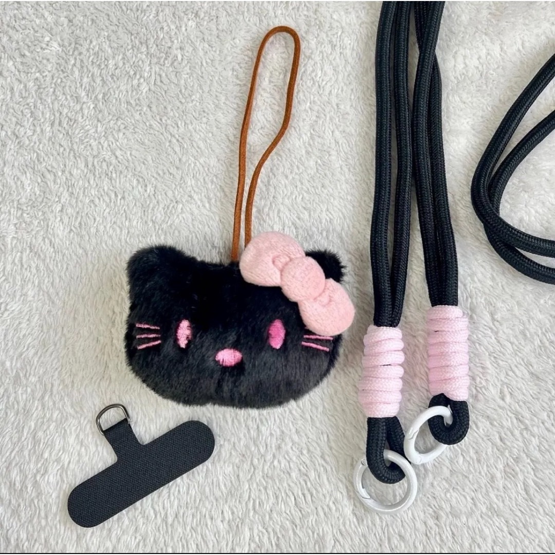 黒キティ　ハローキティ　スマホ ストラップ　スマホショルダー　落下防止　紛失防止 エンタメ/ホビーのおもちゃ/ぬいぐるみ(キャラクターグッズ)の商品写真