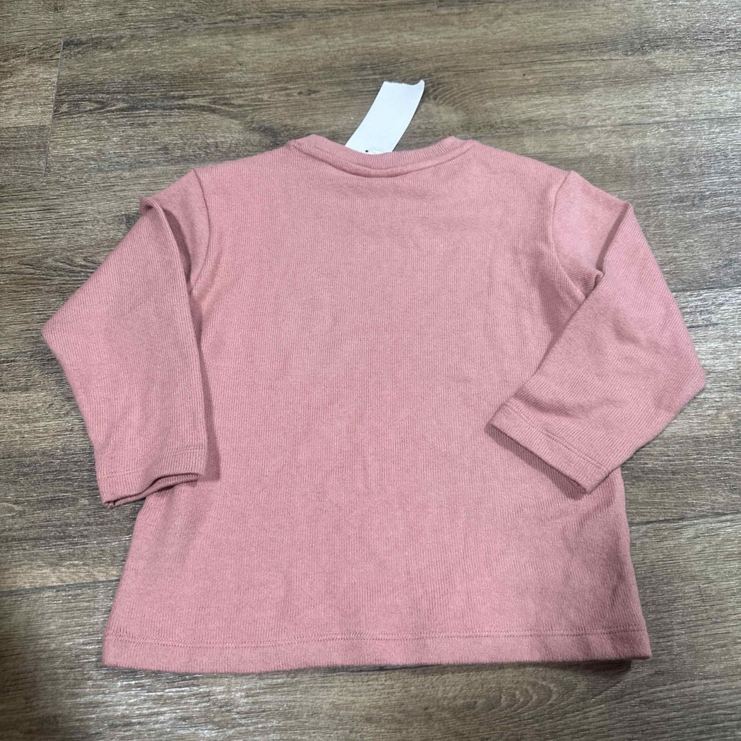 UNIQLO(ユニクロ)の新品 タグ付 ユニクロ ソフトニットフリース 長袖 カットソー 110cm キッズ/ベビー/マタニティのキッズ服女の子用(90cm~)(Tシャツ/カットソー)の商品写真