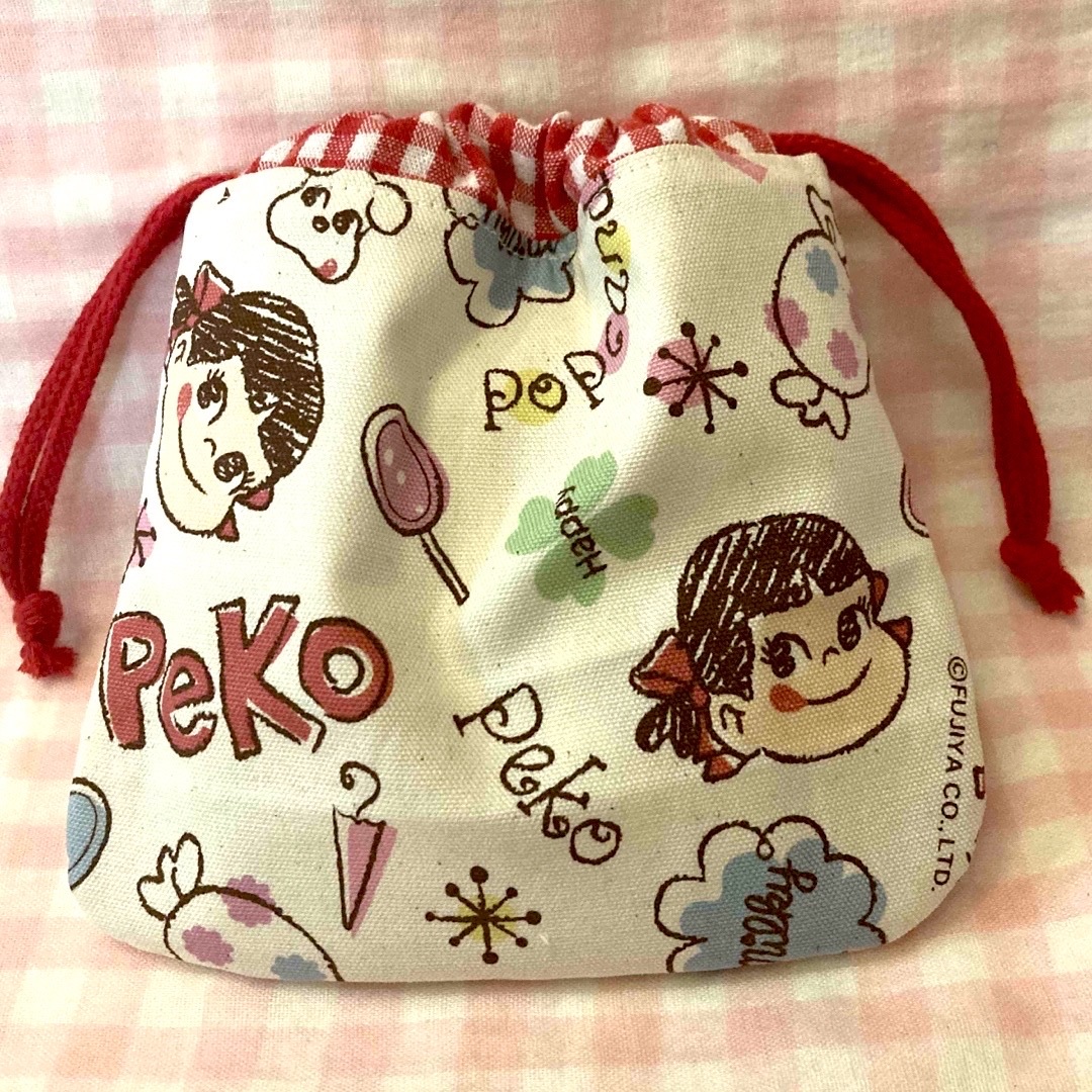 ペコちゃんキャンディ柄☆ハンドメイド☆巾着☆手書き生成り ハンドメイドのファッション小物(その他)の商品写真
