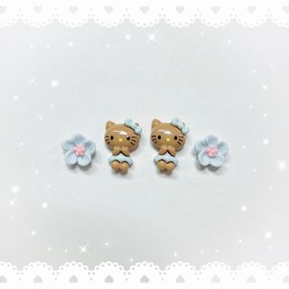 ハローキティ - ネイルパーツ 4P 〈J076〉 日焼けキティ ガングロ 水色 ハイビスカス