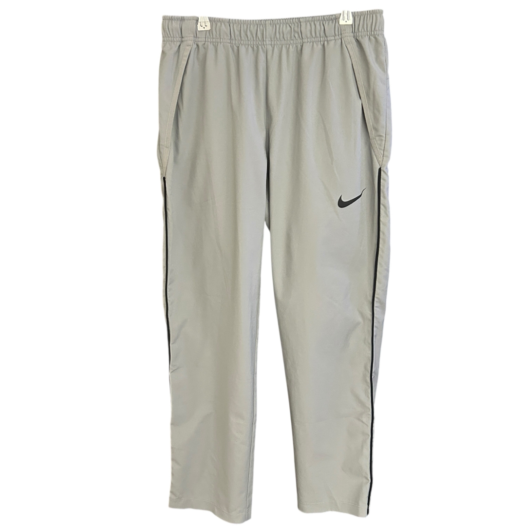 NIKE(ナイキ)のNIKE ウインドブレーカー パンツ ウーブン パンツ サイズL スポーツ/アウトドアのランニング(ウェア)の商品写真