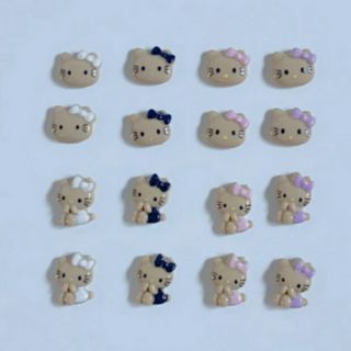 日焼けキティちゃんネイルパーツ 16個セット(デコパーツ)