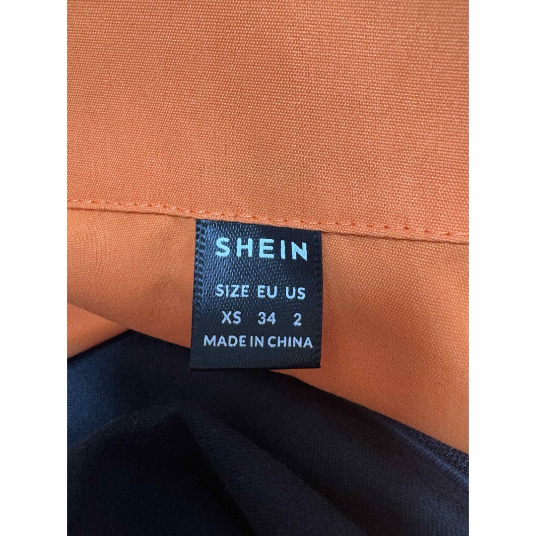 SHEIN(シーイン)のSHEIN オレンジ　シャツ レディースのトップス(シャツ/ブラウス(半袖/袖なし))の商品写真