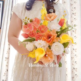 胡蝶蘭とカラーのクラッチブーケ☆ブートニア付き