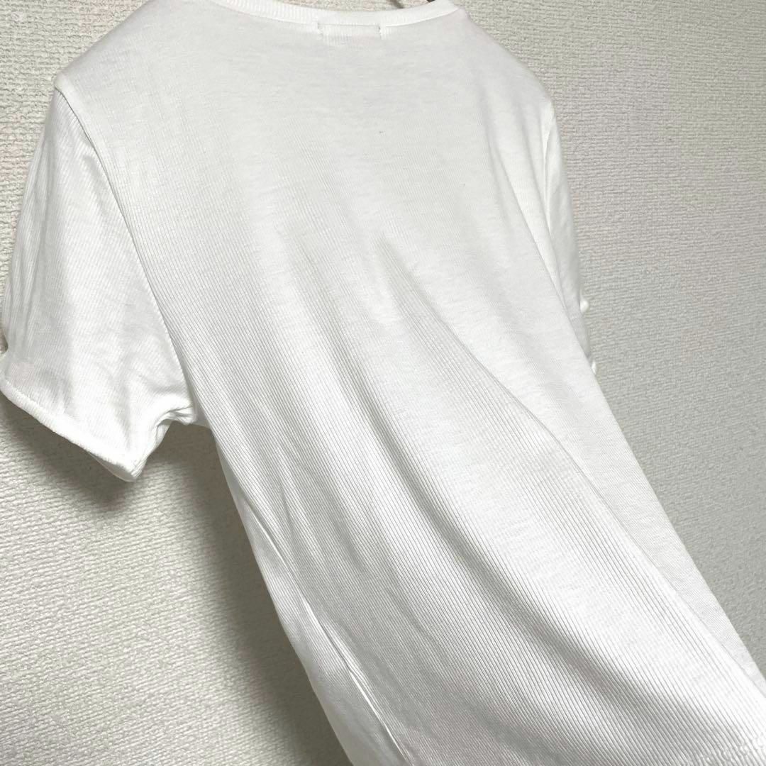 TOCCA(トッカ)のzo710 TOCCA/小さめリボンデザインカットソー/XS/半袖/ボタン/白 レディースのトップス(カットソー(半袖/袖なし))の商品写真