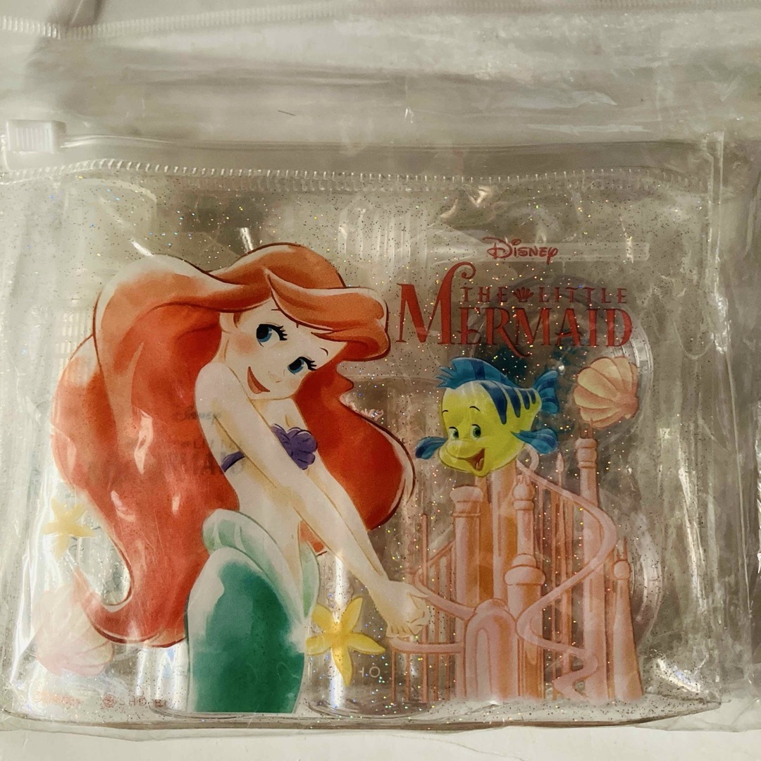 アリエル(アリエル)の新品未使用 アリエル ディズニー人魚姫 トラベルボトルセット ポーチ入り インテリア/住まい/日用品の日用品/生活雑貨/旅行(日用品/生活雑貨)の商品写真
