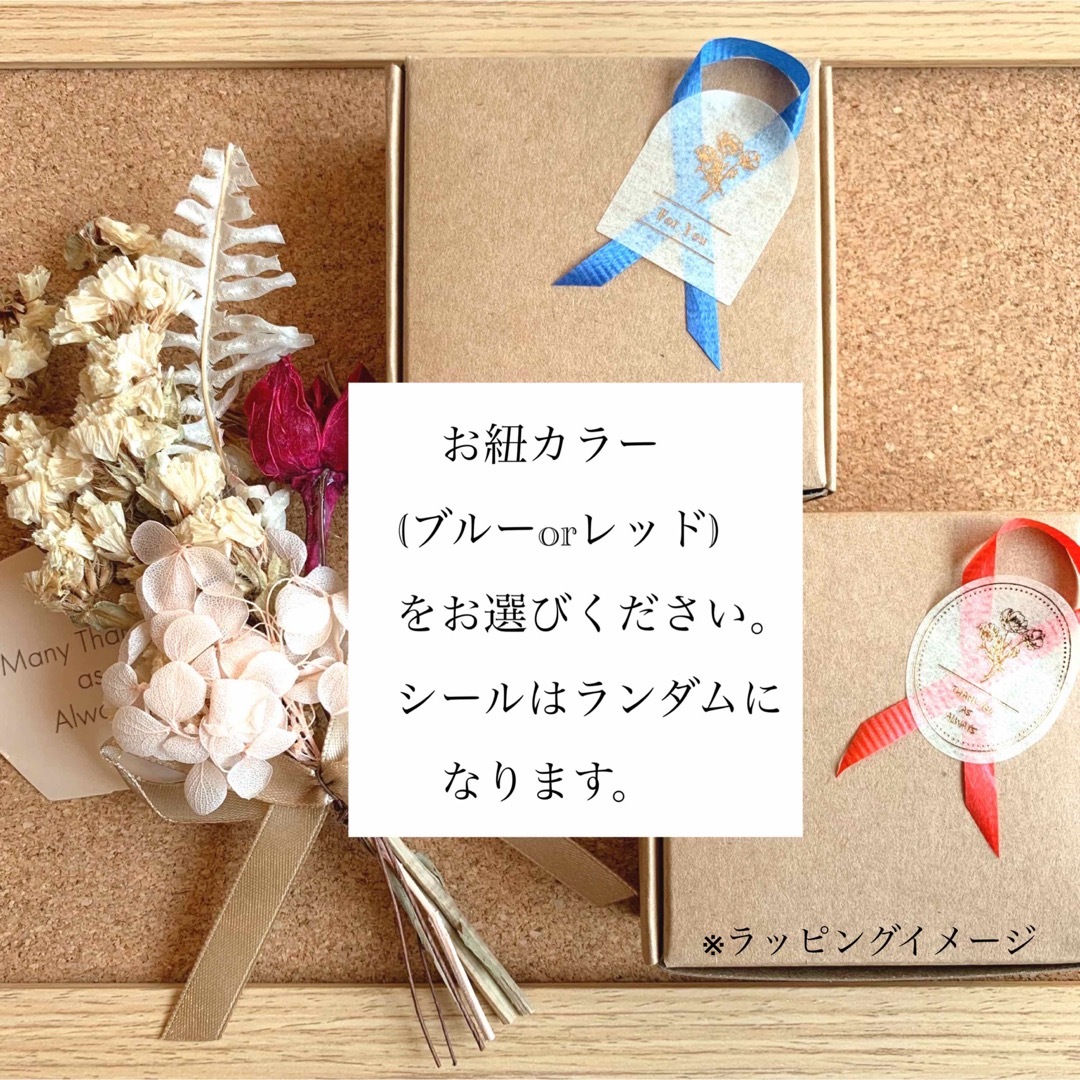 ハンドメイド＊オレンジエスニックボール揺れるアシメイヤリング＊ピアス変更可 ハンドメイドのアクセサリー(イヤリング)の商品写真