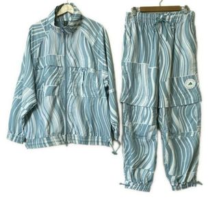アディダスバイステラマッカートニー(adidas by Stella McCartney)のADIDAS BY STELLA McCARTNEY(アディダスバイステラマッカートニー) レディースパンツセットアップ レディース - ライトブルー×白 ジップアップ/ウエストゴム(セット/コーデ)