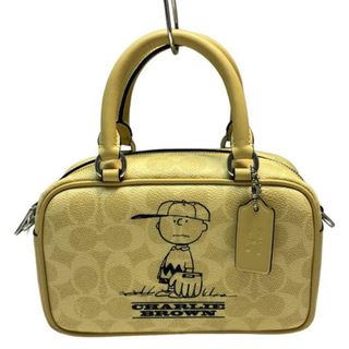 コーチ(COACH)のCOACH(コーチ) ハンドバッグ美品  サッチェル クロスボディ バッグ・シグネチャー キャンバス・チャーリー・ブラウン CBJ63 イエロー レザー(ハンドバッグ)