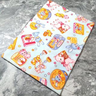 アニマル お菓子 動物 柄 ハギレ 水色 布