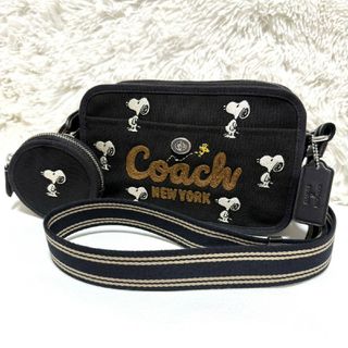コーチ(COACH)の極美品 コーチ ピーナッツ コラボ スヌーピー プリント カメラバッグ ブラック(ショルダーバッグ)
