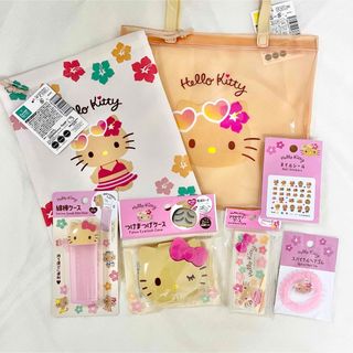 サンリオ(サンリオ)の【新品】サンリオ　日焼けキティ　PVCトートバッグ　巾着　綿棒ケース　ヘアゴム(キャラクターグッズ)