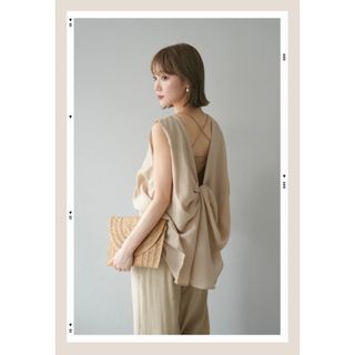 シボ加工バックツイストブラウス　デザイン　frene lumier