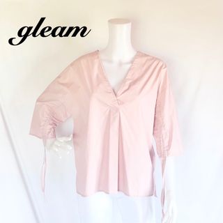 グリーム(gleam)のgleam シャーリング袖バックリボンプルオーバーブラウス 綿100%(シャツ/ブラウス(長袖/七分))