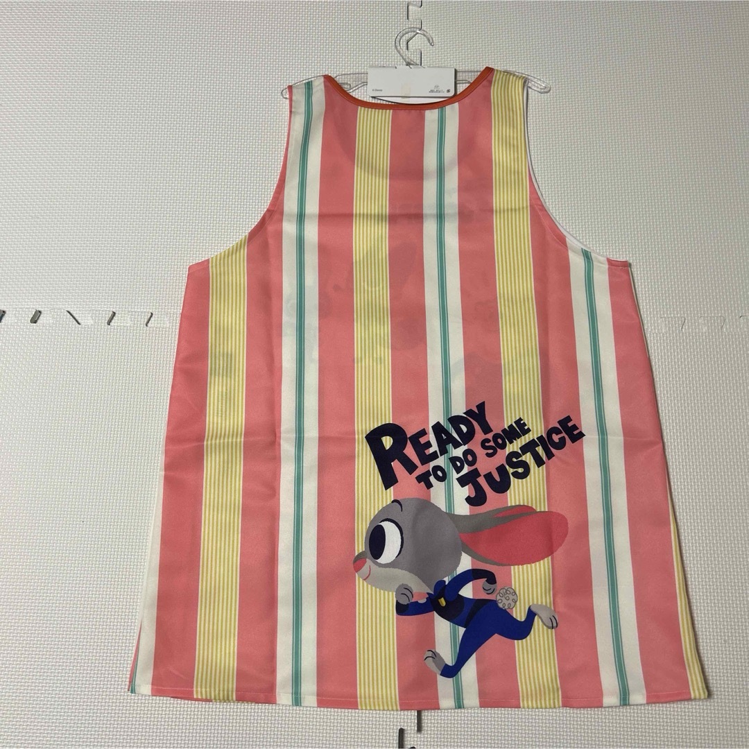 Disney(ディズニー)のズートピア  ピンク　ディズニー保育士エプロン　フリーサイズ　新品未使用 インテリア/住まい/日用品のキッチン/食器(その他)の商品写真