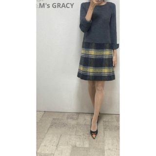 エムズグレイシー(M'S GRACY)の極美品エムズグレイシー裾チェックドッキングワンピース36グレー　ウールワンピース(ひざ丈ワンピース)