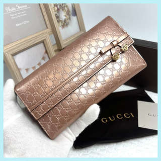 グッチ(GUCCI)の✨極美品✨GUCCI グッチ シャイニーマイクログッチシマ　リボンチャーム長財布(財布)