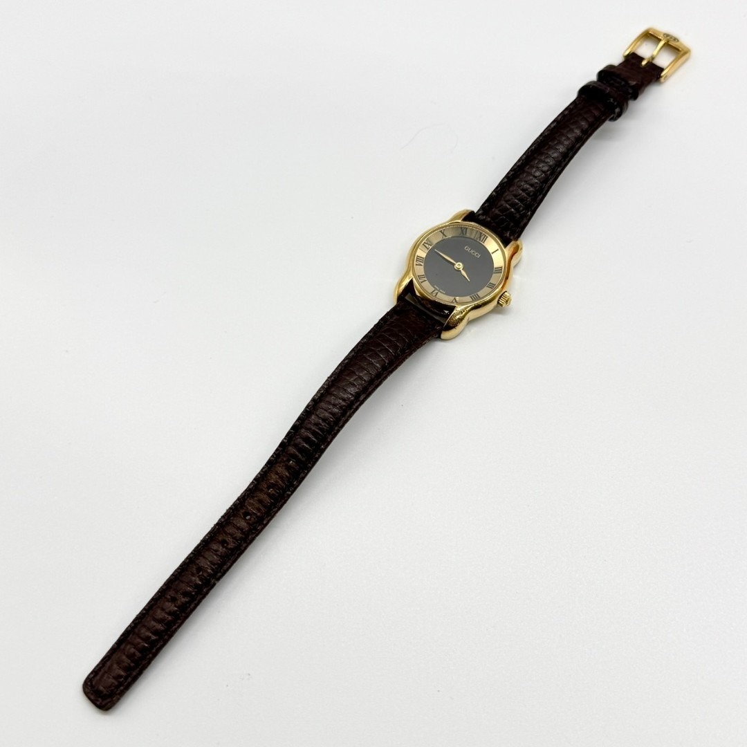 GUCCI(グッチ)の稼働品 GUCCI グッチ 腕時計 黒文字盤 クォーツ ２針 5100L レディースのファッション小物(腕時計)の商品写真