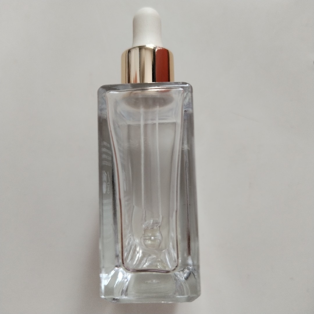 空のガラス瓶(gisou ヘアオイルの空き瓶) インテリア/住まい/日用品のインテリア小物(その他)の商品写真